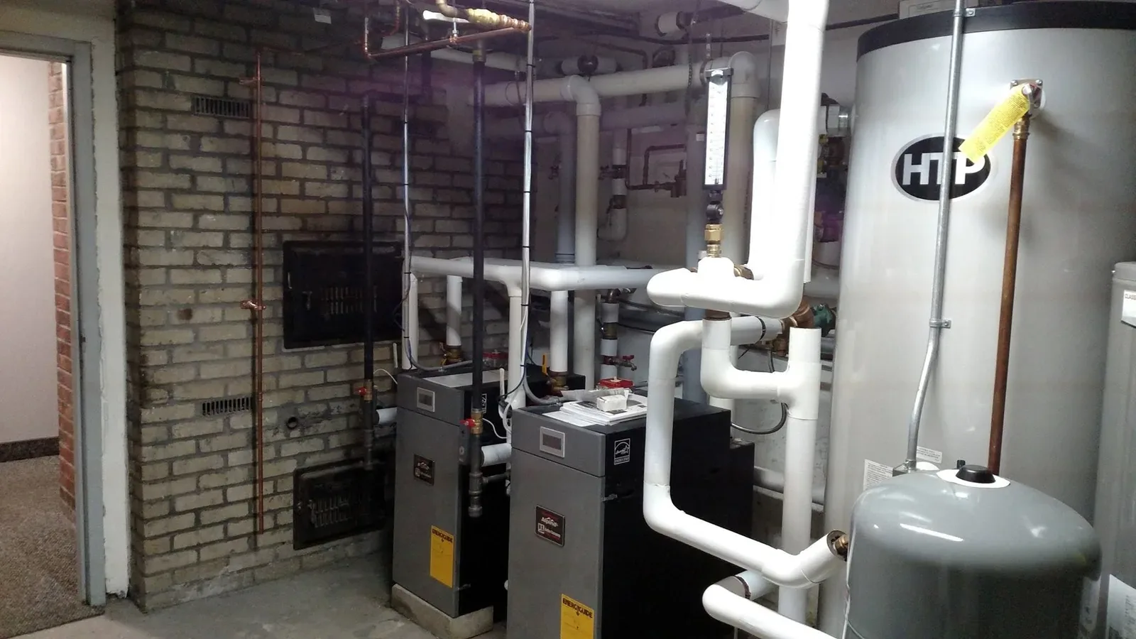 Commercial boiler room with twin HTP high-efficiency water heaters