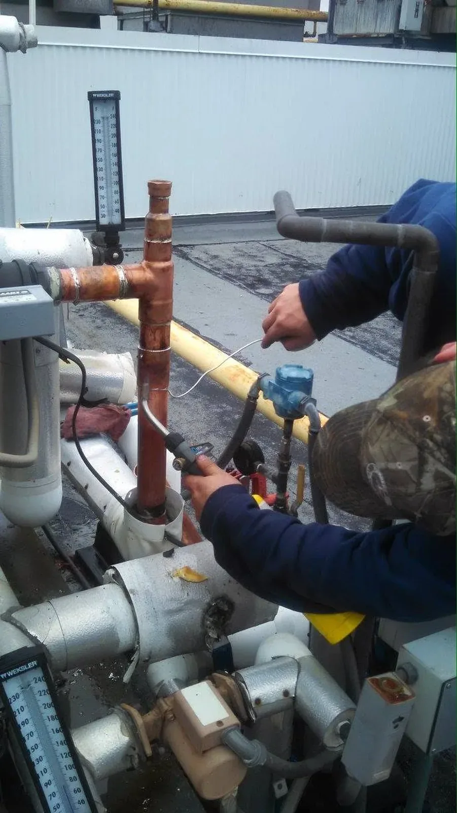 Prime Plumbing technician running new copper gas piping